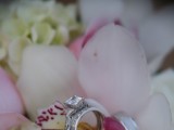 wedding bands in flowers