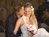 groom kisses bride at their Hawaii Weddings