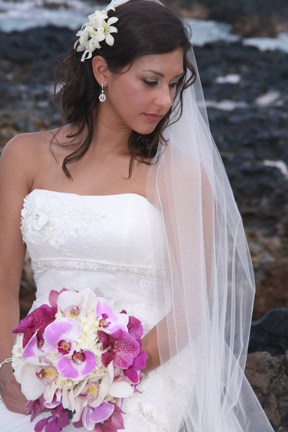 bride with orchid bouquet in Hawaii