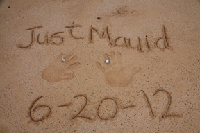 Just Maui'd in the sand at wedding in hawaii
