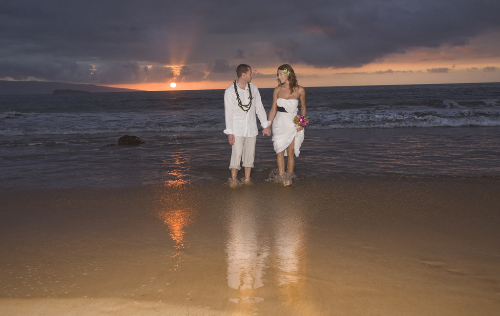 Maui Sunset wedding couple in water