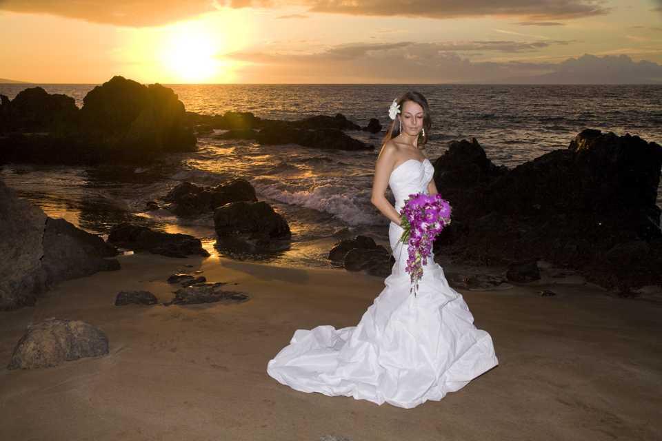 wedding photographer on maui captures bride at sunset